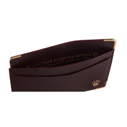 495 - A brown leather Rolex card wallet.