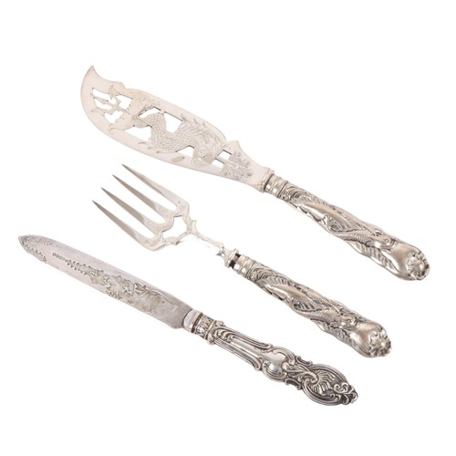 529 - A pair of Victorian silver plated fish servers; together with a similar bread knife (3).