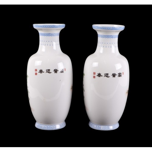 708 - A pair of Chinese Republic style vases decorated with a robed woman amongst flowers and calligraphy,... 