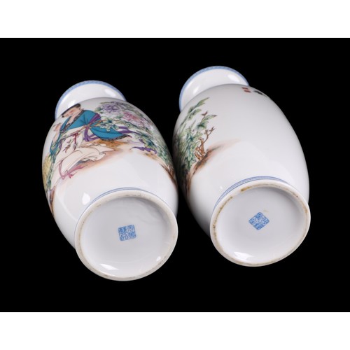 708 - A pair of Chinese Republic style vases decorated with a robed woman amongst flowers and calligraphy,... 