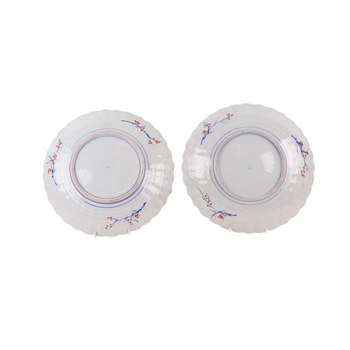741 - Two Japanese Imari plates, each 31cms diameter (one a/f).