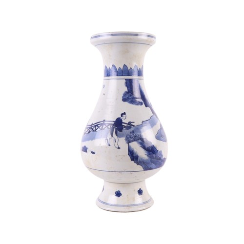 743 - A Chinese blue and white baluster vase, decorated figures in a landscape, 36cm high.