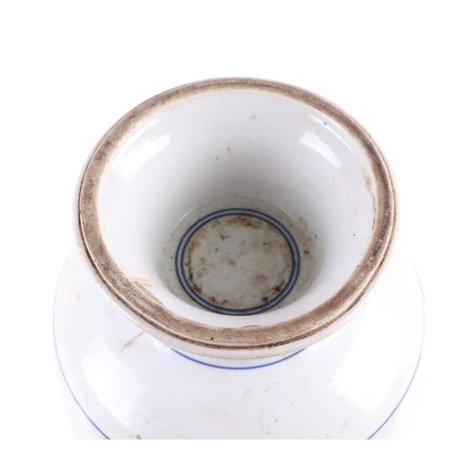 743 - A Chinese blue and white baluster vase, decorated figures in a landscape, 36cm high.