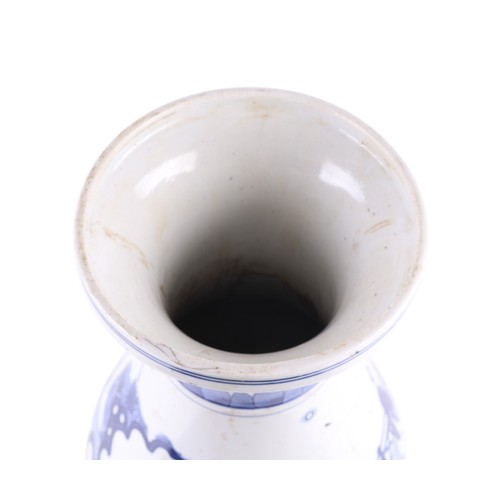 743 - A Chinese blue and white baluster vase, decorated figures in a landscape, 36cm high.