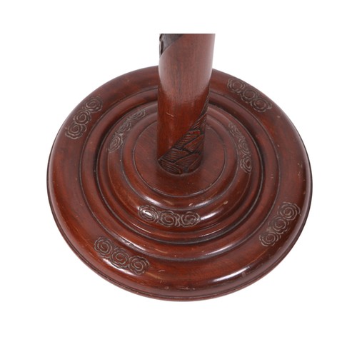 758 - A Chinese carved wooden standard lamp, 155cms high.