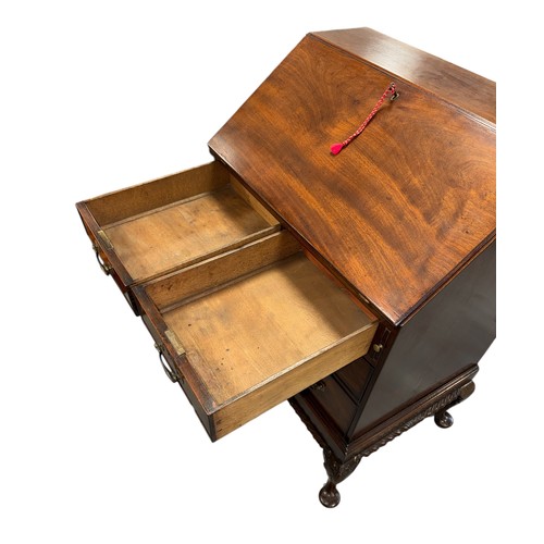 776 - A George III style mahogany bureau, the fall-front opening to reveal a fitted interior with pigeon h... 