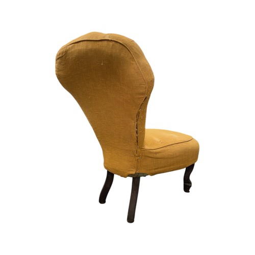 786 - A Victorian upholstered nursing chair with spoon back and seat and carved mahogany dwarf cabriole fr... 