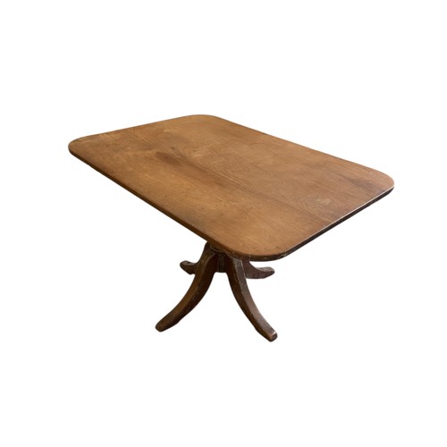 812 - A Victorian mahogany tilt-top breakfast table on turned column and quatrefoil base, 83 by 118cms.