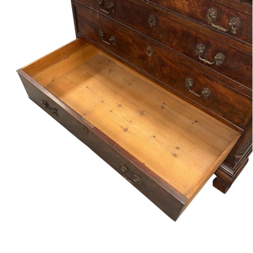 837 - An early 19th century mahogany bureau, the fall-flap enclosing a fitted interior above four graduate... 