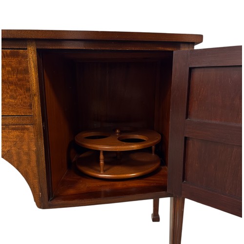 849 - A George III style mahogany bowfronted sideboard with central frieze drawer flanked by cupboards, 16... 