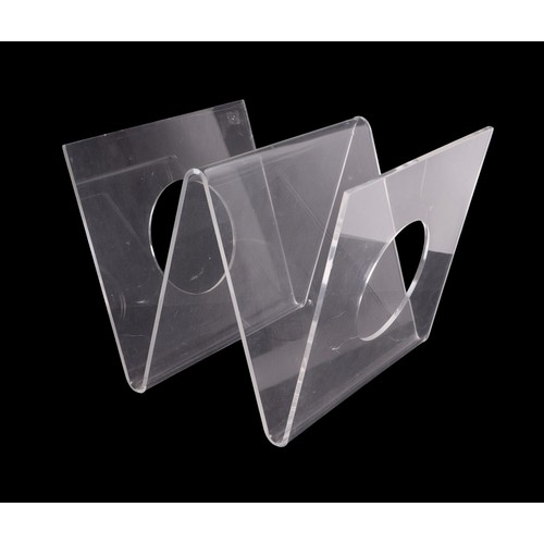 873 - A 1970s Perspex magazine rack, 29cms high.