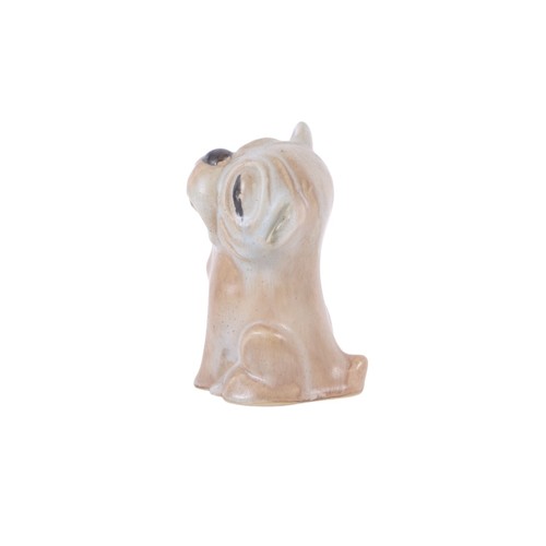 352 - An early 20th century Langley pottery model of a Bonzo style dog, 16cms high.