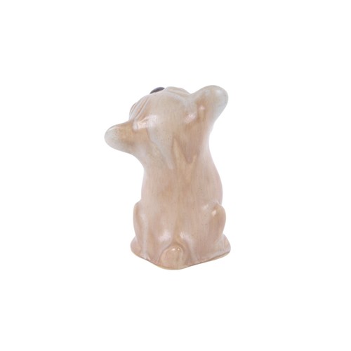 352 - An early 20th century Langley pottery model of a Bonzo style dog, 16cms high.