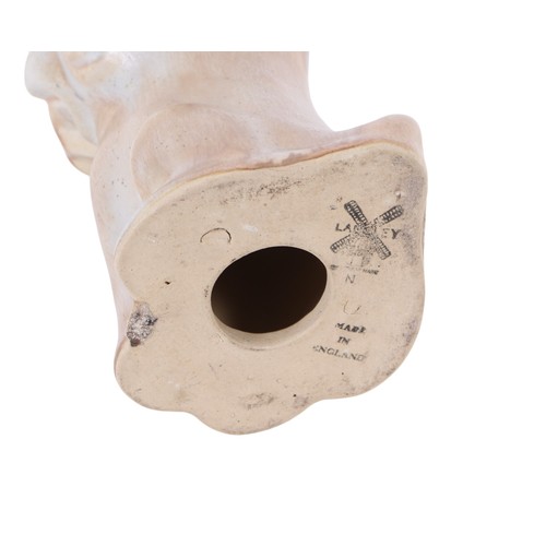 352 - An early 20th century Langley pottery model of a Bonzo style dog, 16cms high.