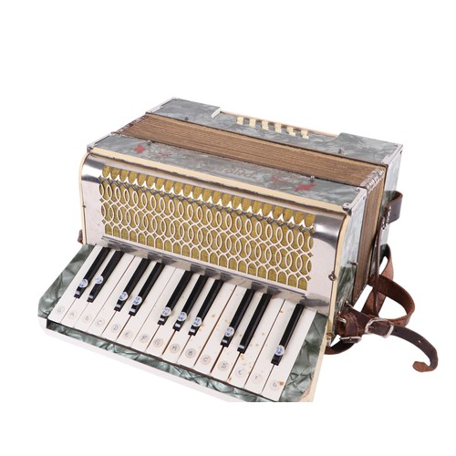 379 - A Puratone piano accordian, cased.