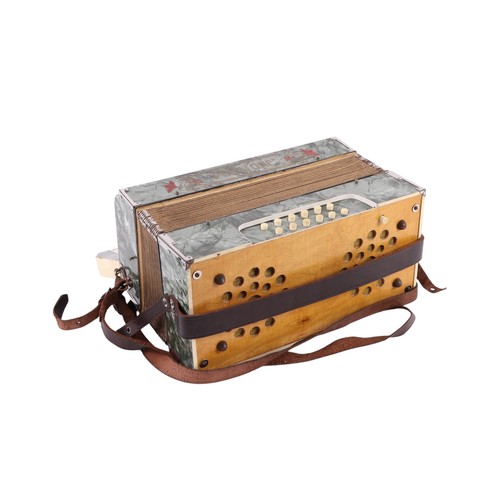 379 - A Puratone piano accordian, cased.