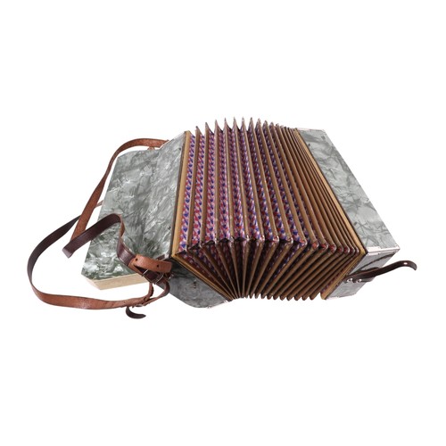 379 - A Puratone piano accordian, cased.