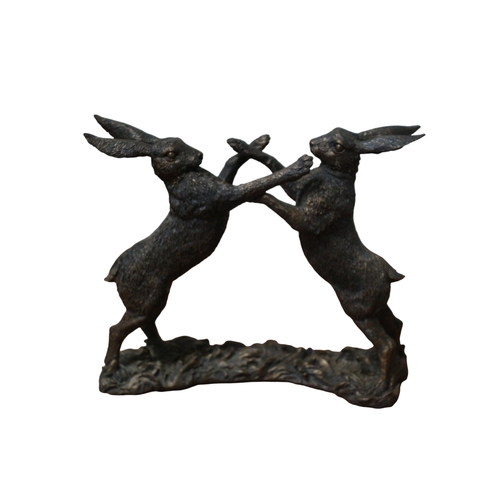 50 - Pair of Cotemporary Bronzed Resin Hares Boxing, 22cm long x 19cm tall