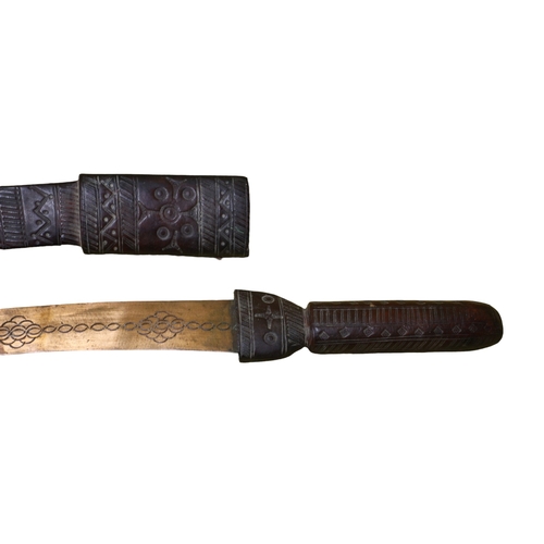 40 - Early 20th Century African Tribal Sword in Leather Sheath with Ornate Carved Workmanship on it - Bla... 