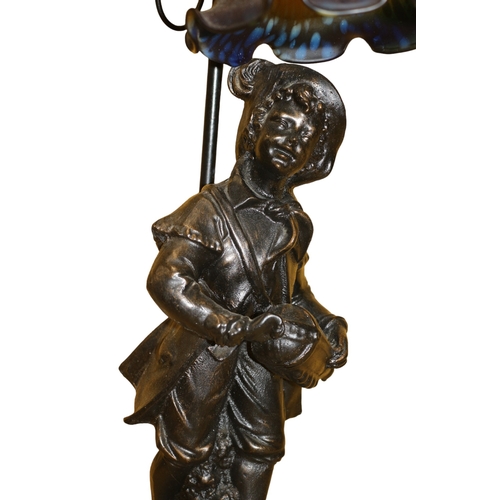 42 - Bronzed Tall Working Table Lamp in The Design of a Young Boy with a Mottled Glass Shade - 61cm Tall