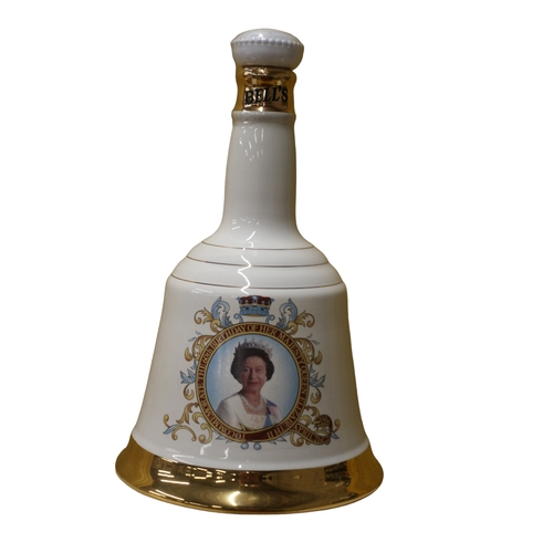 56 - Sealed and Full Bells Whisky in Wade Decanter to Commemorate Queen Elizabeth II 60th Birthday 1986