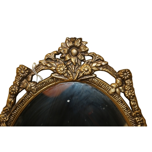 130 - Mid Century Metal Edged Oval Mirror, 50 x 27.5cm