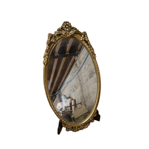 130 - Mid Century Metal Edged Oval Mirror, 50 x 27.5cm