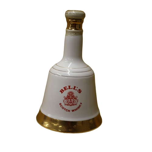 171 - Sealed and Full Bells Whisky in Wade Decanter to Commemorate the Birth of Prince Henry 1984