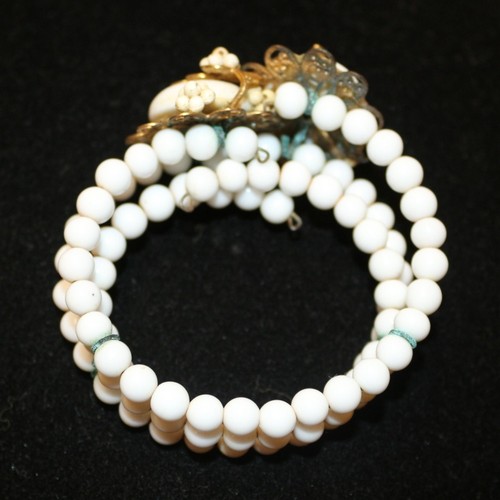 23 - 1970's Vintage Miriam Haskell White Bead Spiral Bracelet with Gold Filigree