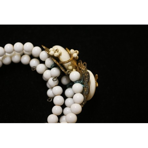 23 - 1970's Vintage Miriam Haskell White Bead Spiral Bracelet with Gold Filigree