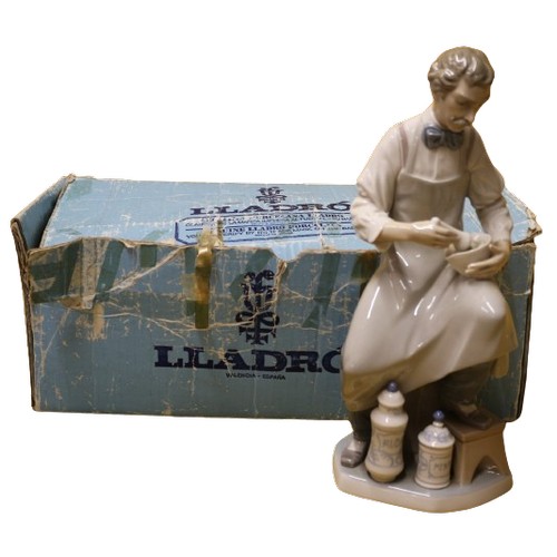 59 - Lladro Boxed and Mint 'Pharmacist' 4844, 34cm Tall