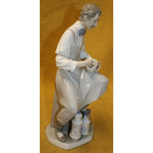 59 - Lladro Boxed and Mint 'Pharmacist' 4844, 34cm Tall