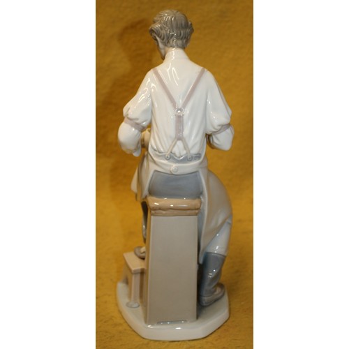 59 - Lladro Boxed and Mint 'Pharmacist' 4844, 34cm Tall