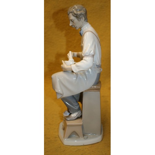 59 - Lladro Boxed and Mint 'Pharmacist' 4844, 34cm Tall