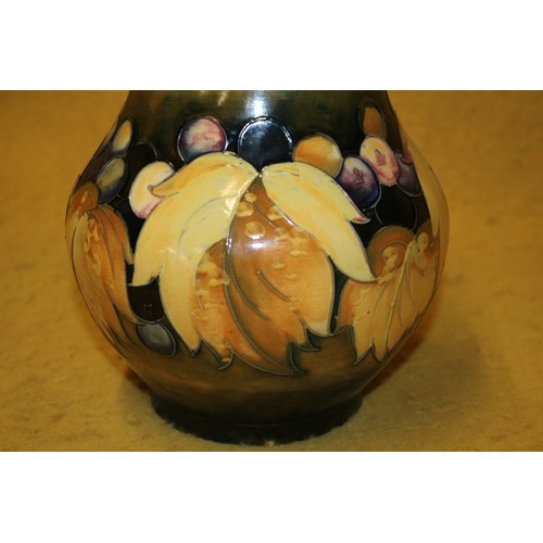 79 - Moorcroft 'Leaf & Berry' Signed William Moorcroft, 20th Century, 22cm Tall x 16cm Diameterhttps:... 