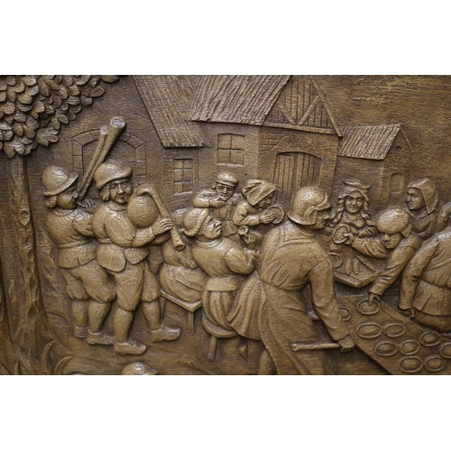 38 - Hand Carved Black Forest Oak Panel Depicting a Medieval Market Scene with Couples Dancing, Musicians... 