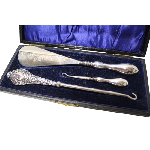 7 - Silver Handled Button Hooks and Shoe Horn in Case, Silver Hallmarked. Total 77.98g