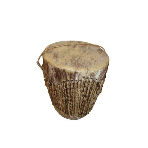 10 - Skin and Fur Drums 16cm Tall