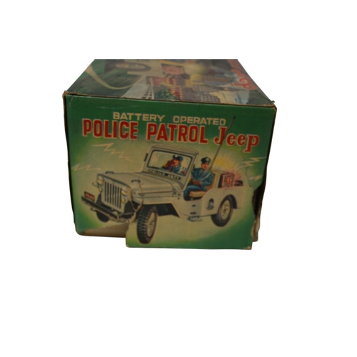 24 - Vintage Nomura Japanese Police Patrol Jeep in Original Box