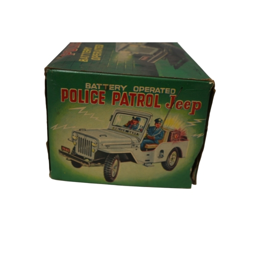 24 - Vintage Nomura Japanese Police Patrol Jeep in Original Box