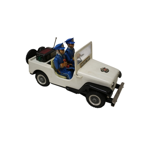 24 - Vintage Nomura Japanese Police Patrol Jeep in Original Box