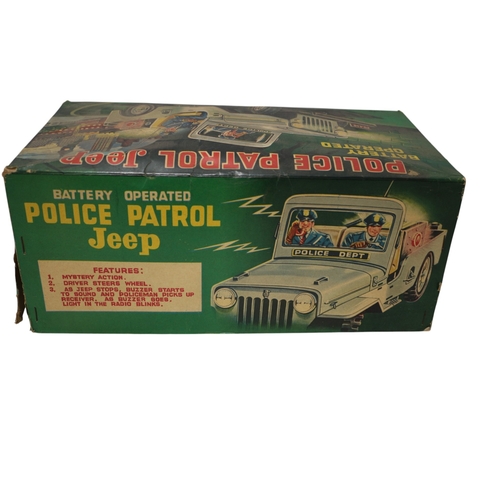 24 - Vintage Nomura Japanese Police Patrol Jeep in Original Box