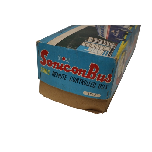 28 - Masudaya Tin Sonicon Bus Battery Operated Remote Controlled with Whistle in Original Box