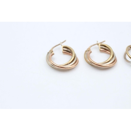 123 - 2 x 9ct Gold hoop earrings inc. tri-tone, twisted 3.6 grams gross