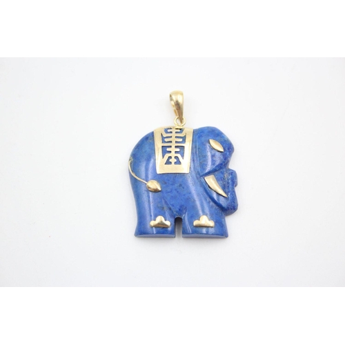 128 - 2 x 9ct gold oriental elephant gemstone pendants inc. lapis, onyx 11 grams gross