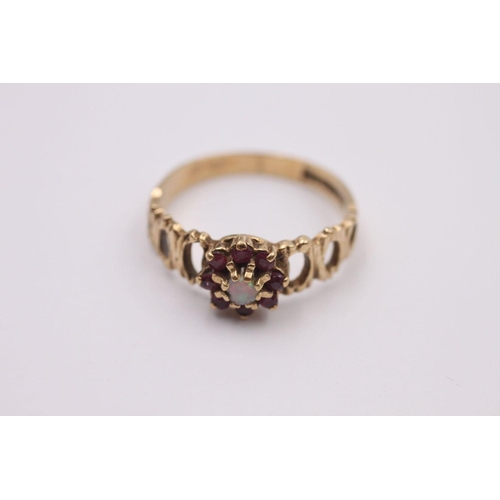 133 - 9ct vintage gold opal & ruby halo ring 2.3 grams gross