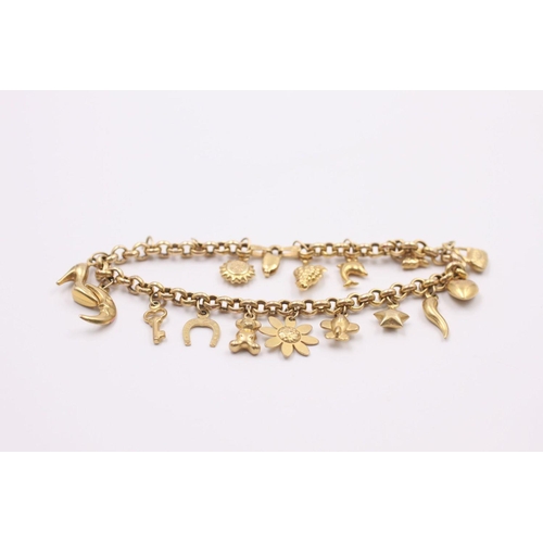 136 - 9ct gold charm bracelet with 15 charms 8.3 grams gross