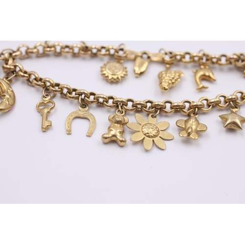 136 - 9ct gold charm bracelet with 15 charms 8.3 grams gross