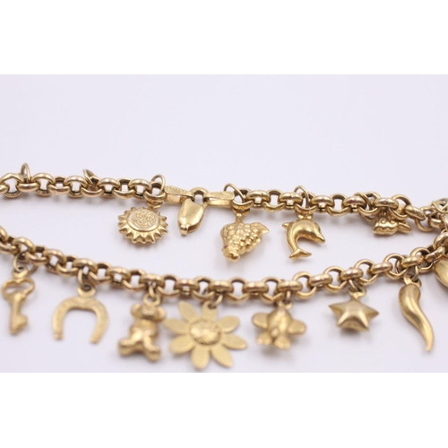 136 - 9ct gold charm bracelet with 15 charms 8.3 grams gross