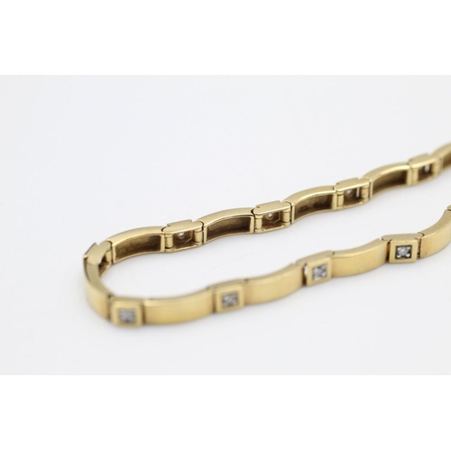 143 - 9ct gold diamond wave chain bracelet 8.5 grams gross